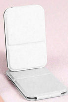 Compact white travel pocket mirror with durable PU leather case for on-the-go touch-ups