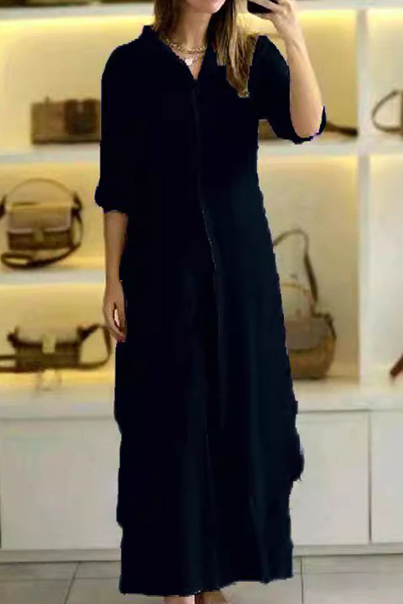 Woman wearing black refined comfort coordinated wide-leg two-piece outfit in modern boutique setting
