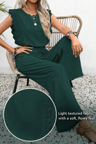 Elegant two-piece set in dark green with lace detail and soft textured fabric, perfect for comfortable, stylish wear.
