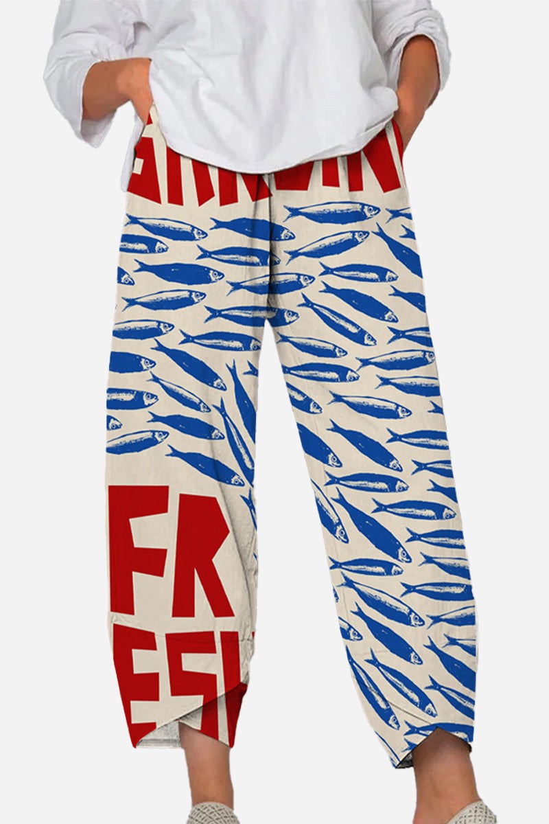Breathable cropped pants with artistic sardine pattern in blue and red on light fabric