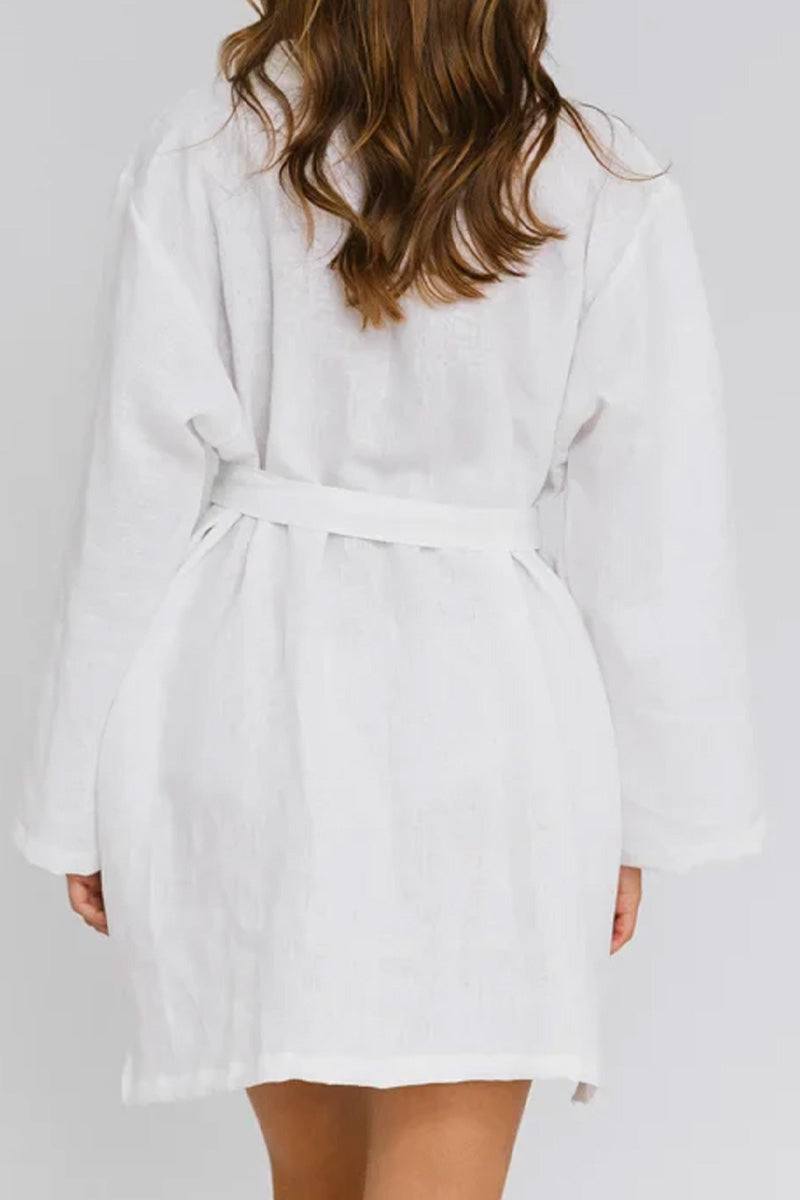 White cotton-linen blend luxury spa robe with belt, breathable and soft fabric, relaxed fit, ideal for comfort and elegance.