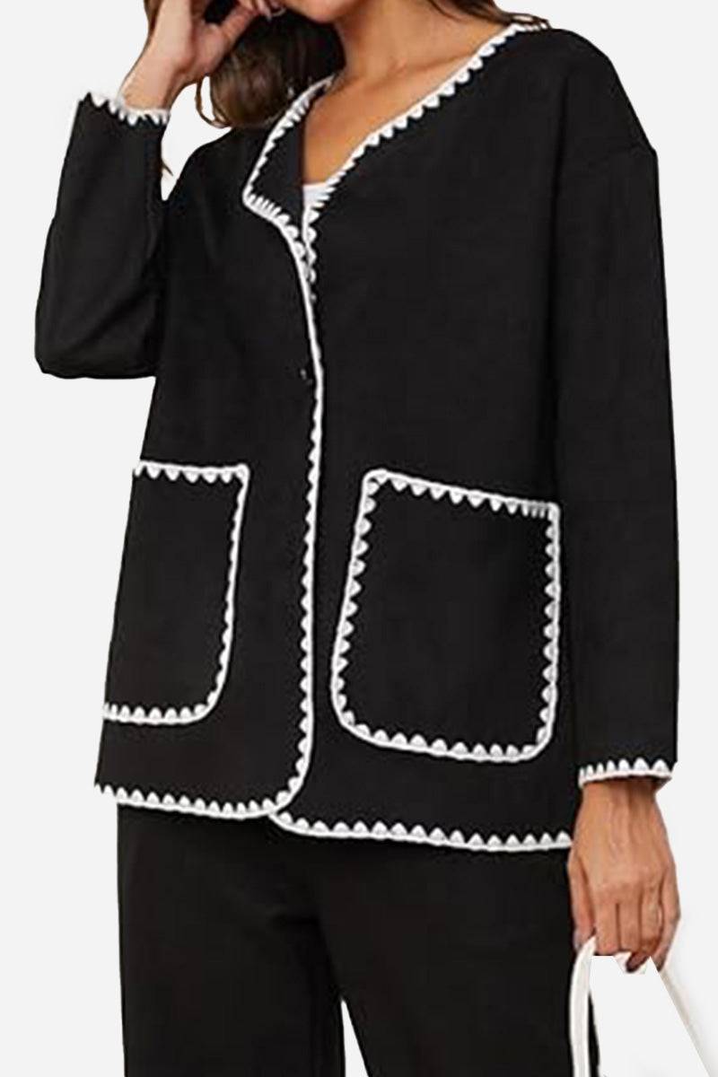 Black contrast-trim knit cardigan with button front and pockets, part of a stylish and comfortable matching set