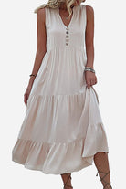 Bohemian tiered midi dress with V-neck and button detail in light beige flowing viscose fabric