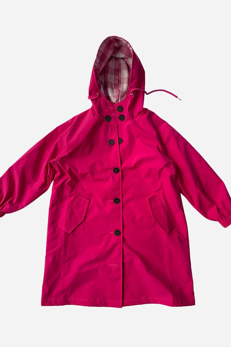 Junior water resistant oversized hooded windbreaker rain jacket for kids in bright pink polyester