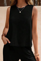 Black sleeveless wide leg pants set with soft, wrinkle-resistant fabric perfect for comfortable, stylish travel and casual wear.