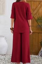 Wrinkle-Free Wide Leg & Top Set in red polyester fabric, featuring a relaxed button-front top and wide-leg palazzo pants.