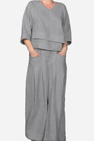 Atelier Serenity Layered Two-Piece Set with breathable fabric and relaxed wide-leg trousers in soft gray