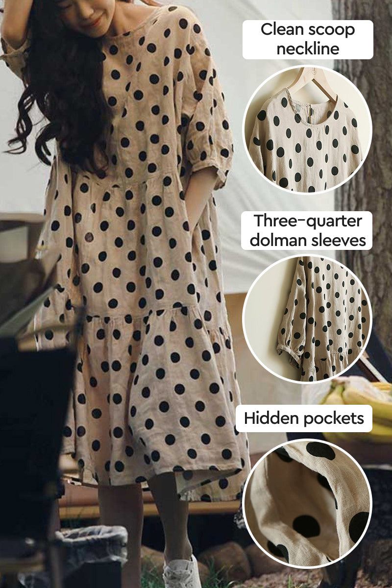 Cottage Garden 100% linen dress with black polka dots, clean scoop neckline, three-quarter dolman sleeves, tiered relaxed fit, and hidden pockets.