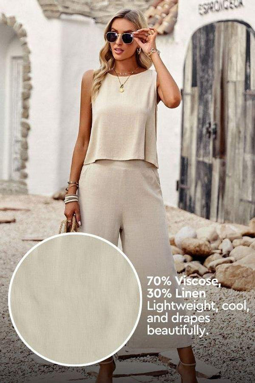 Woman wearing beige sleeveless top and wide-leg pants Villa Lounge Linen Set in lightweight viscose linen fabric outdoors
