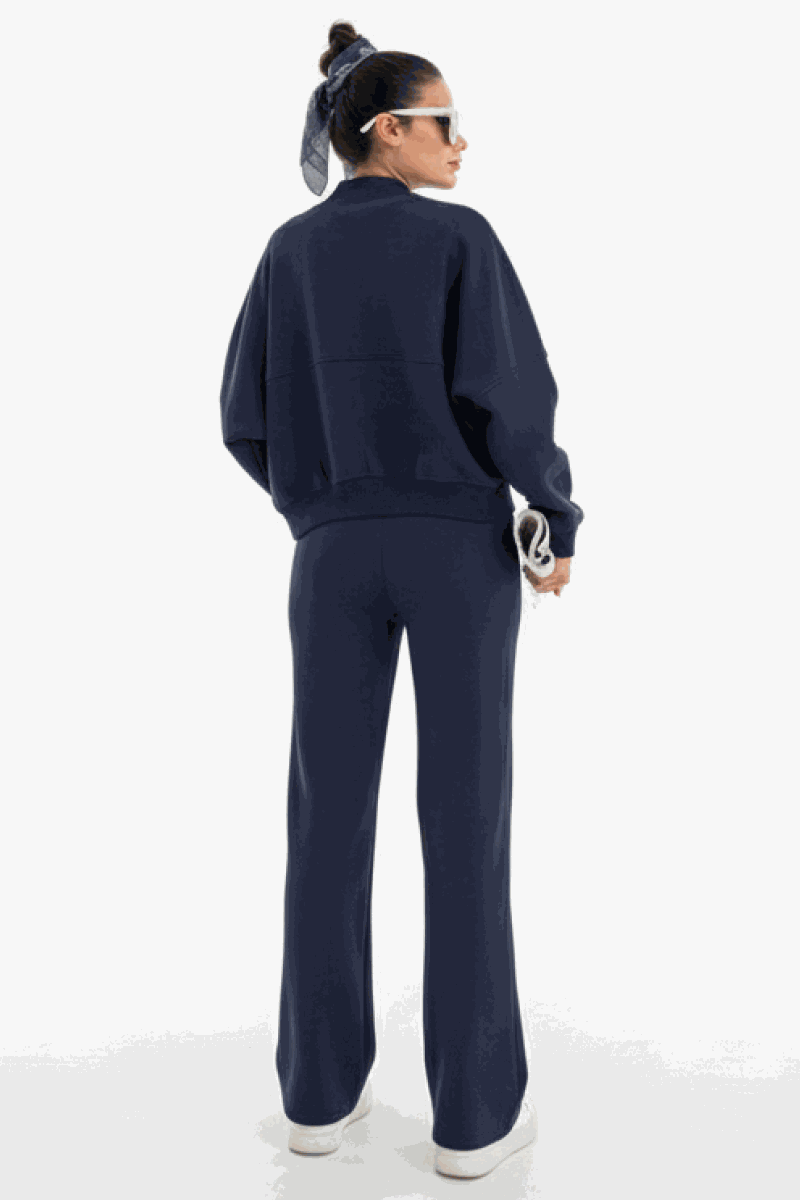 The Voyager Zip Set navy zip-front sweatshirt and wide-leg joggers travel outfit back view
