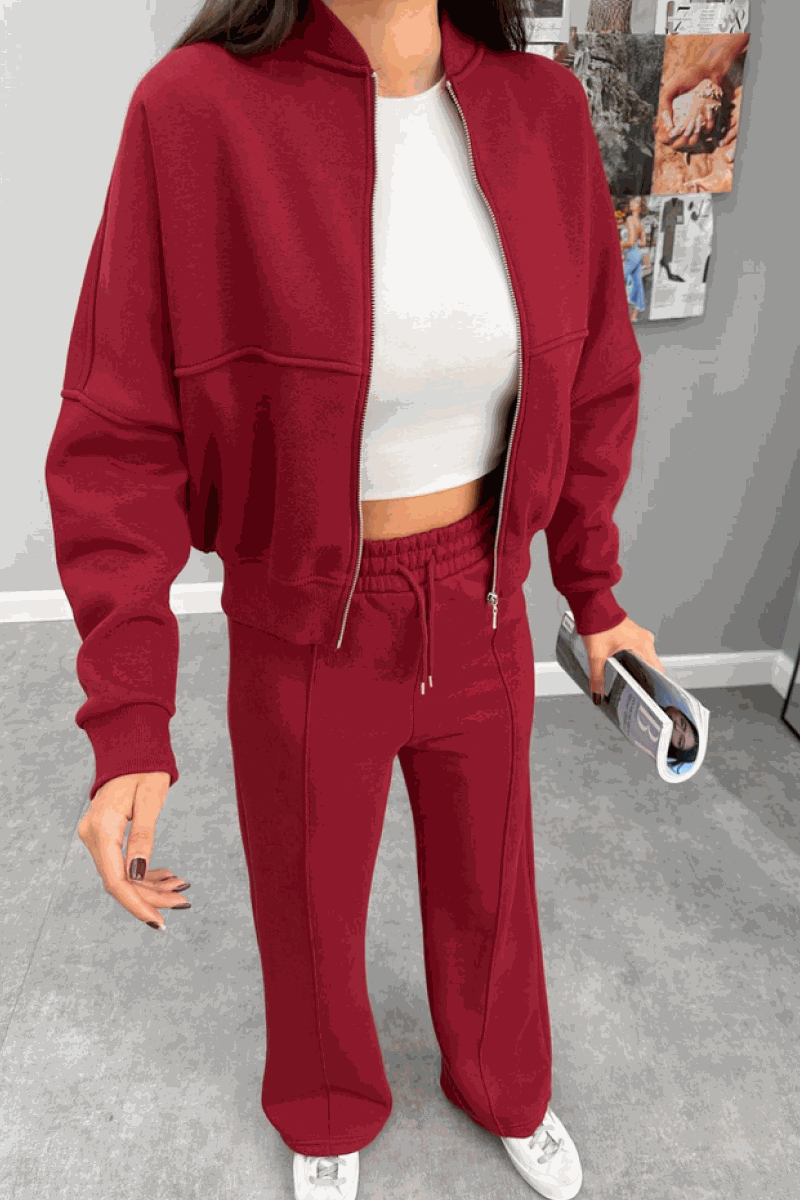 The Voyager Zip Set in red zip-front sweatshirt and wide-leg joggers travel outfit