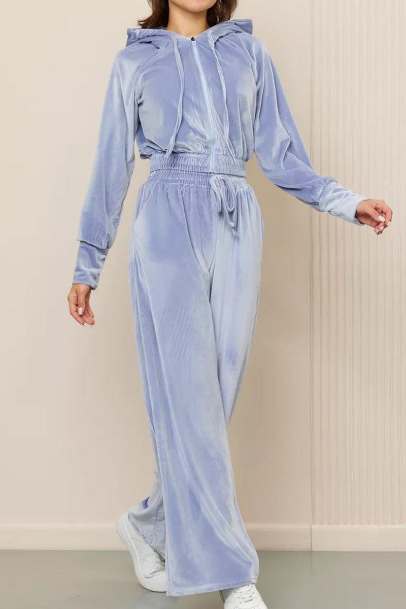 Light blue velour tracksuit with cropped hoodie and high-waist pants for comfortable stylish wear
