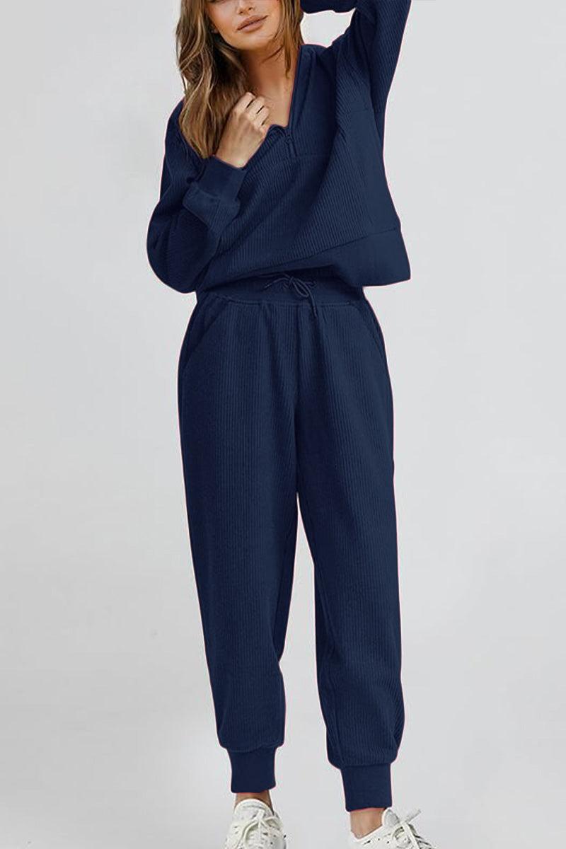 Unisex half-zip pullover and sweatpants set in navy blue, lightweight polyester blend for casual comfort and style