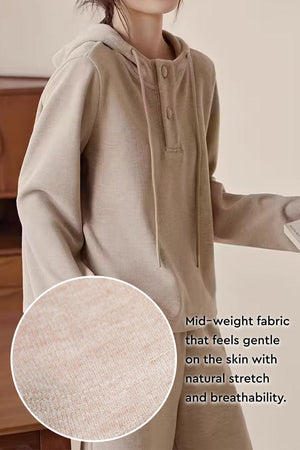 Quiet Comfort Everyday two-piece set with soft mid-weight ribbed knit hoodie and wide-leg pants for breathable, relaxed elegance.