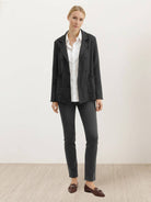 Modern double-breasted blazer with raw-edge seaming and cotton-blend fabric