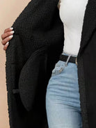 Relaxed faux suede sherpa coat with mid-thigh length and contrast trim