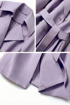 Close-up views of a lavender timeless retro belted trench coat with wide lapels, double-breasted buttons, and adjustable waist belt.