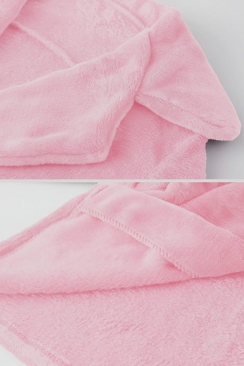 Soft pink open front oversized faux fur jacket with plush texture and draped shawl collar