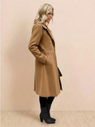 Tailored fit and flare trench coat with A-line silhouette and double-breasted buttons in non-wool fabric