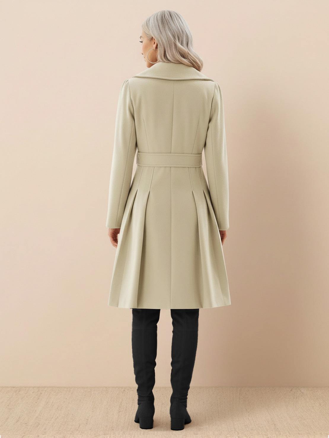 Tailored fit and flare trench coat with double-breasted buttons and pleated hem, non-wool fabric.