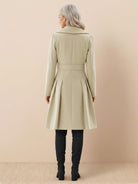 Tailored fit and flare trench coat with double-breasted buttons and pleated hem, non-wool fabric.