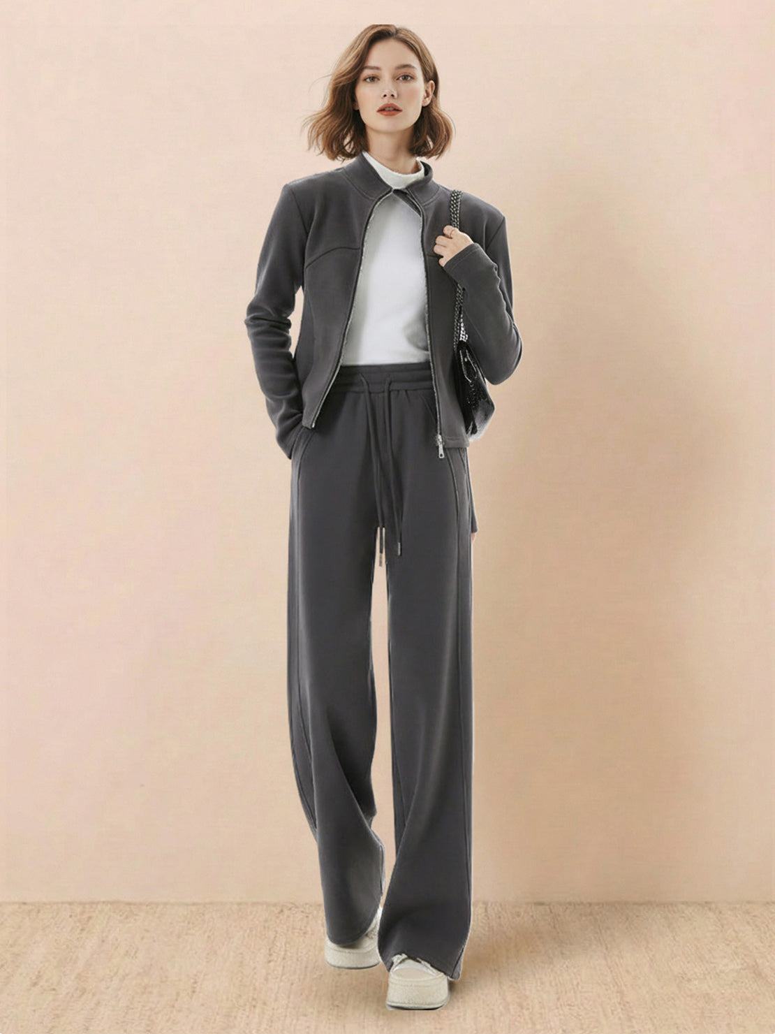 woman wearing warm, wrinkle-resistant nano-fleece zip two-piece set with hip-length jacket and wide-leg pants