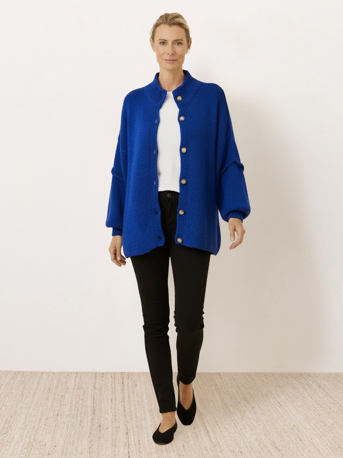 Oversized button-front knit cardigan with balloon sleeves and gold-tone buttons