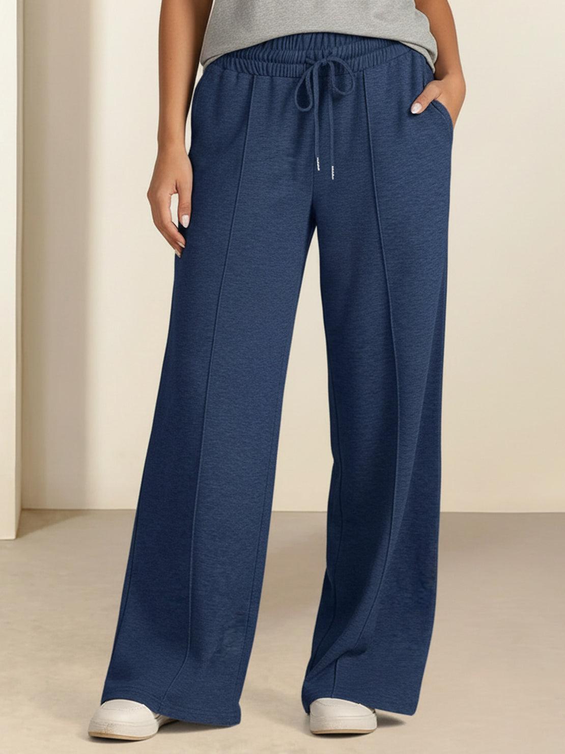 Soft knit wide-leg pants with elastic drawstring waist and breathable fabric.