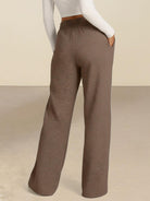 Soft knit wide-leg pants with breathable fabric and elastic drawstring waist