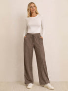 Soft knit wide-leg pants with breathable fabric and adjustable waistband