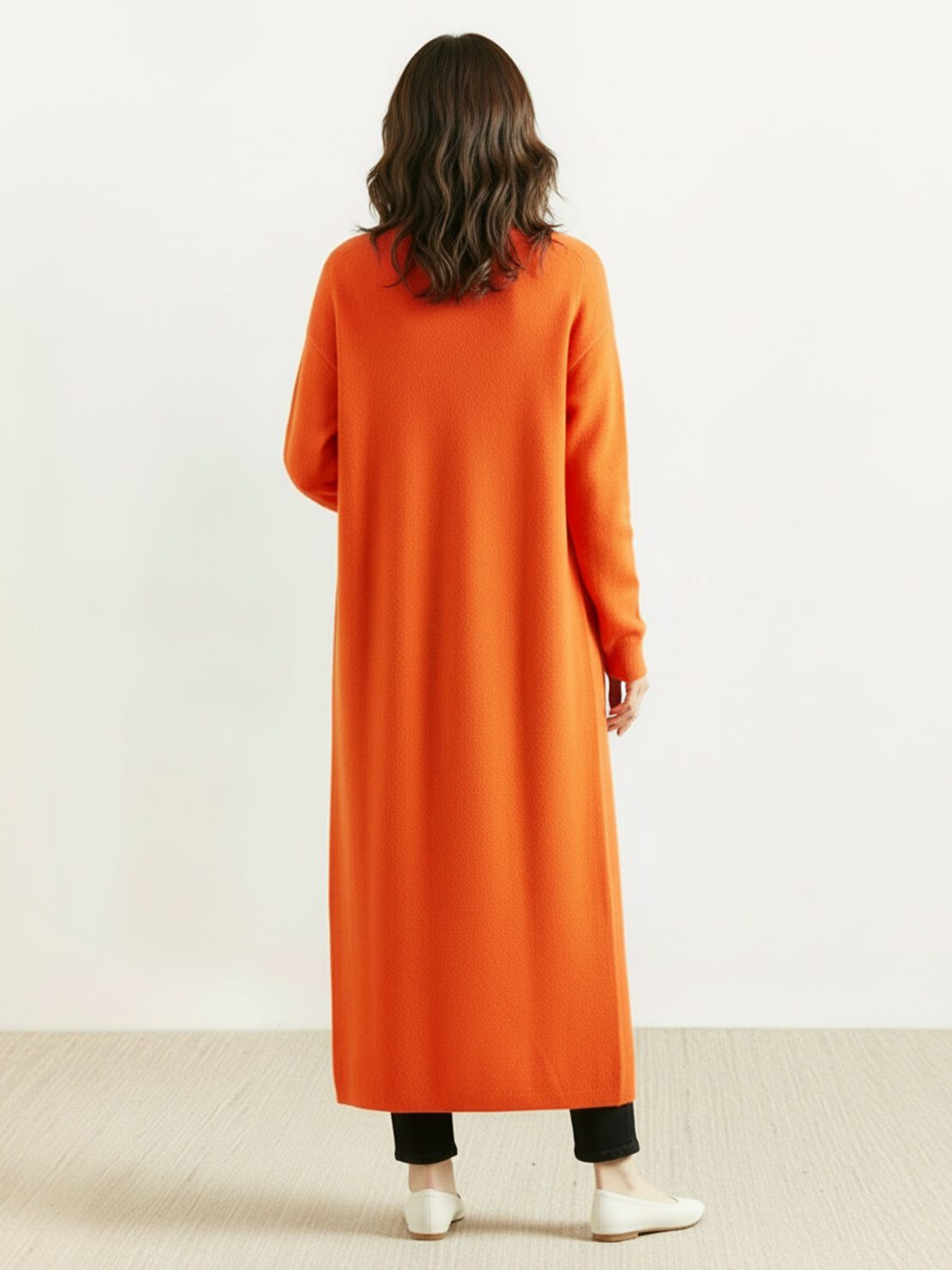 100% Australian Merino Wool longline cardigan with open front and ribbed cuffs