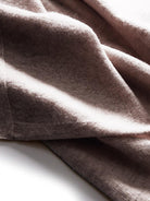 Long Australian Merino Wool cardigan with open front and ribbed cuffs, perfect for layering in cooler seasons