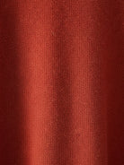 Woman wearing oversized long-line loungewear set with pullover and wide-leg pants