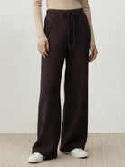 lightweight wool wide leg pants in neutral color with soft brushed texture and relaxed fit