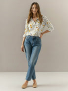 floral button-down shirt with long roll-up sleeves and relaxed fit