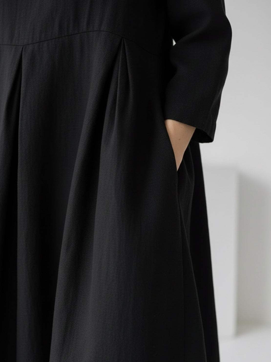 Lightweight cotton-linen empire waist dress with natural crinkle texture and side pockets