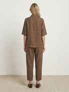 100% cotton two-piece artisan set with oversized button-front shirt and wide-leg cropped pants