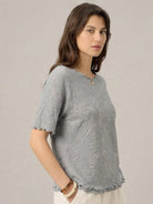 Women's Floral Jacquard Pleated Top with flutter sleeves and 3D floral texture