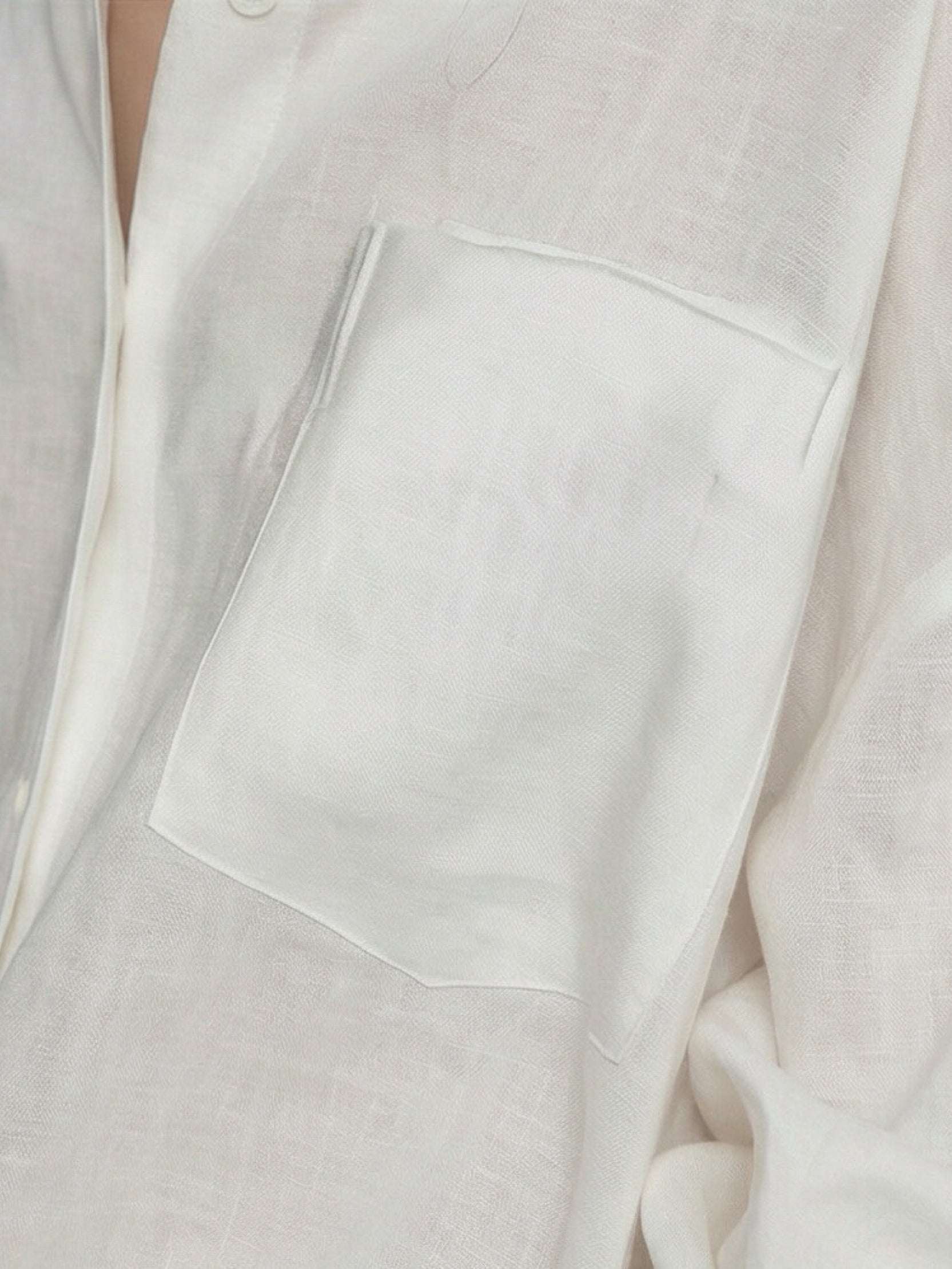 Oversized 100% cotton-linen classic shirt with dropped shoulders, curved hem, and breathable fabric