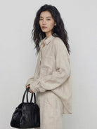 100% cotton-linen oversized shirt with dropped shoulders and curved hem in lightweight breathable fabric