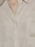 100% cotton-linen oversized relaxed fit shirt with dropped shoulders and curved hem