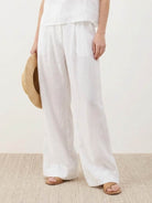 White Tencel-linen pleated wide-leg pants with hook-and-zip closure