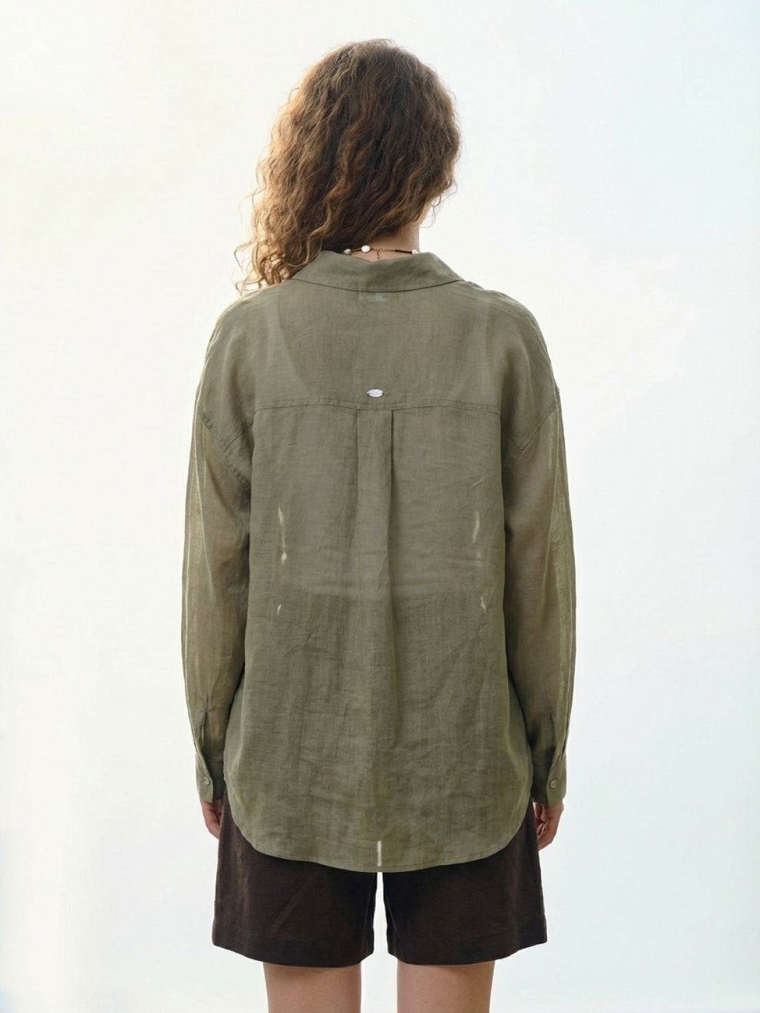 100% linen sheer overshirt with relaxed oversized fit, button front, long sleeves, and semi-transparent fabric