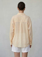 100% linen sheer overshirt with oversized fit, classic collar, and breathable lightweight fabric