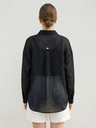Lightweight 100% linen sheer overshirt with oversized fit and button front