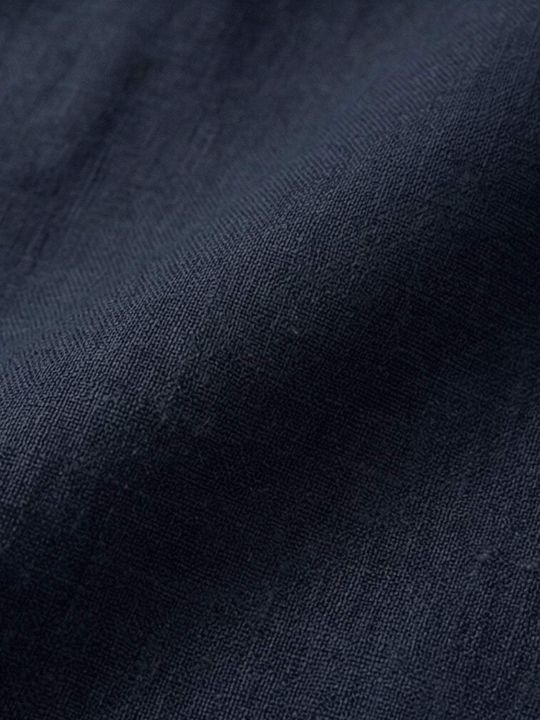 100% linen two-way button blouse with Peter Pan collar and cap sleeves in relaxed A-line fit