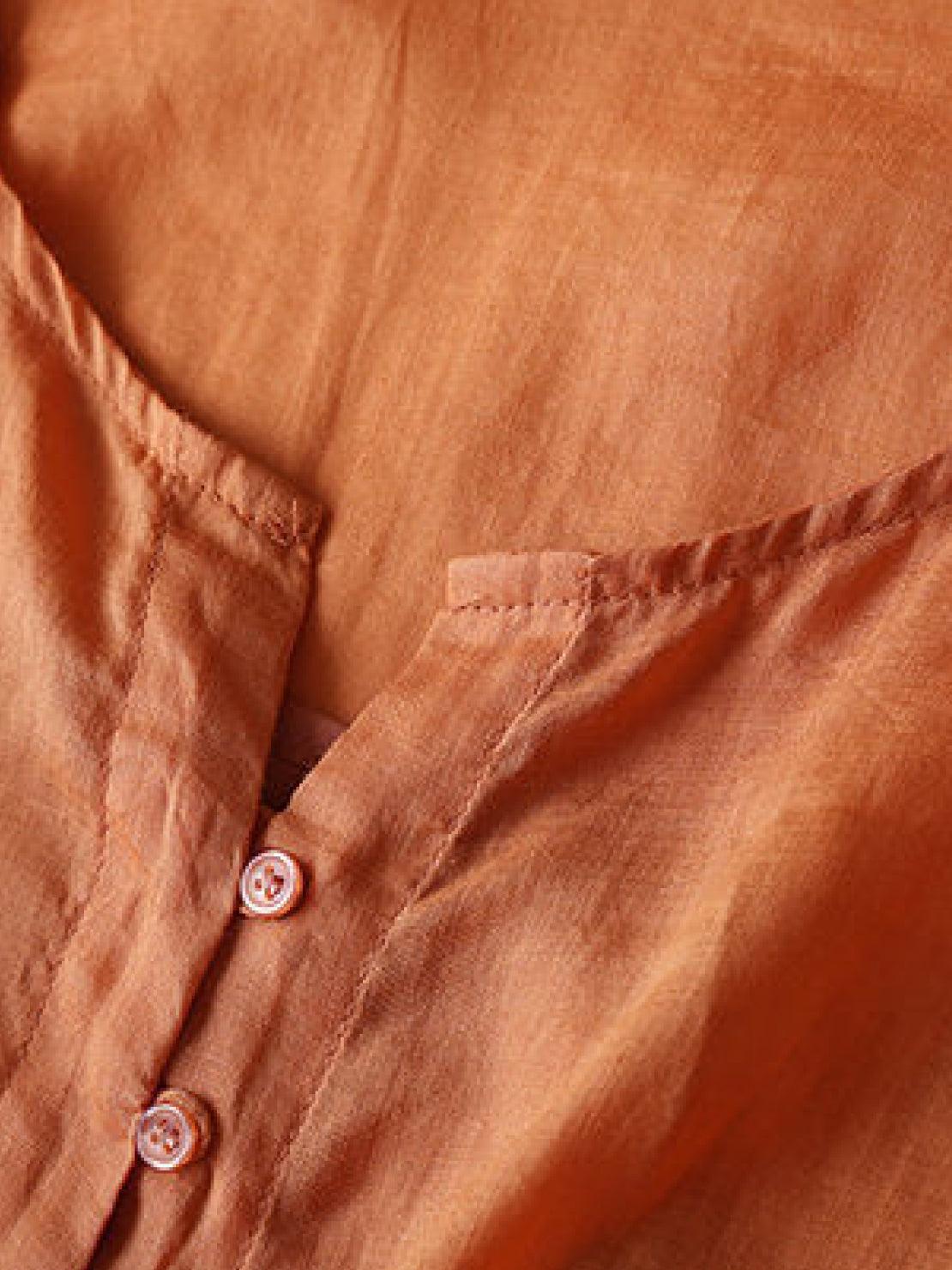 Orange cotton linen midi dress with smocked waist and embroidery