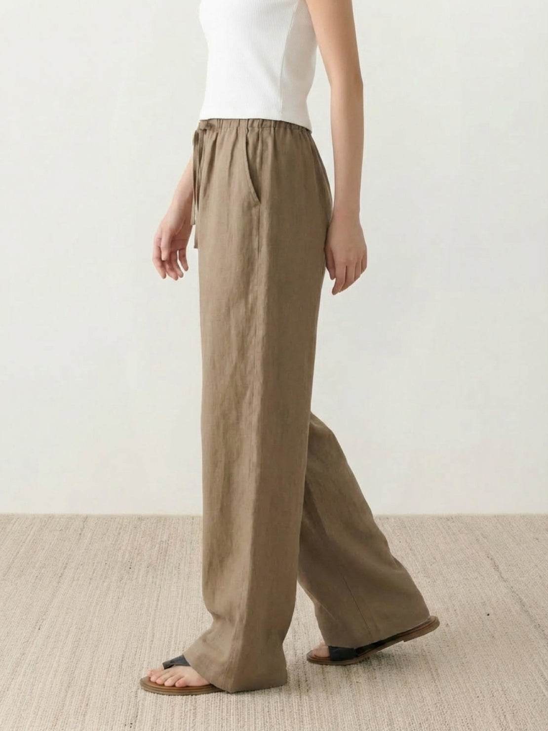 100% linen wide-leg pants with high-rise elastic waistband and side pockets