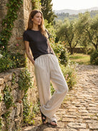 100% linen wide-leg high-rise pants with elastic waistband and side pockets