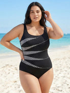 Curve-Fit Open-Back Swimsuit with scoop front, adjustable straps, and diagonal back panels in black polyester fabric